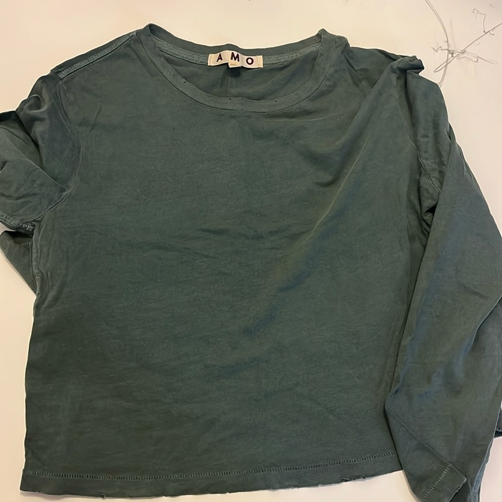 A olive green crop long sleeve tee